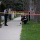 Police work to find evidence at the scene of a fatal shooting of a 16-year-old boy and the wounding of an 18-year-old man in Chicago on April 25, 2016.
Joshua Lott/Getty Images